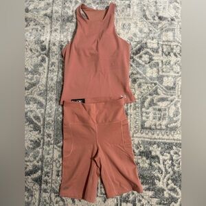 Women's under armour rust color tank and bike shirt set Xs nwt